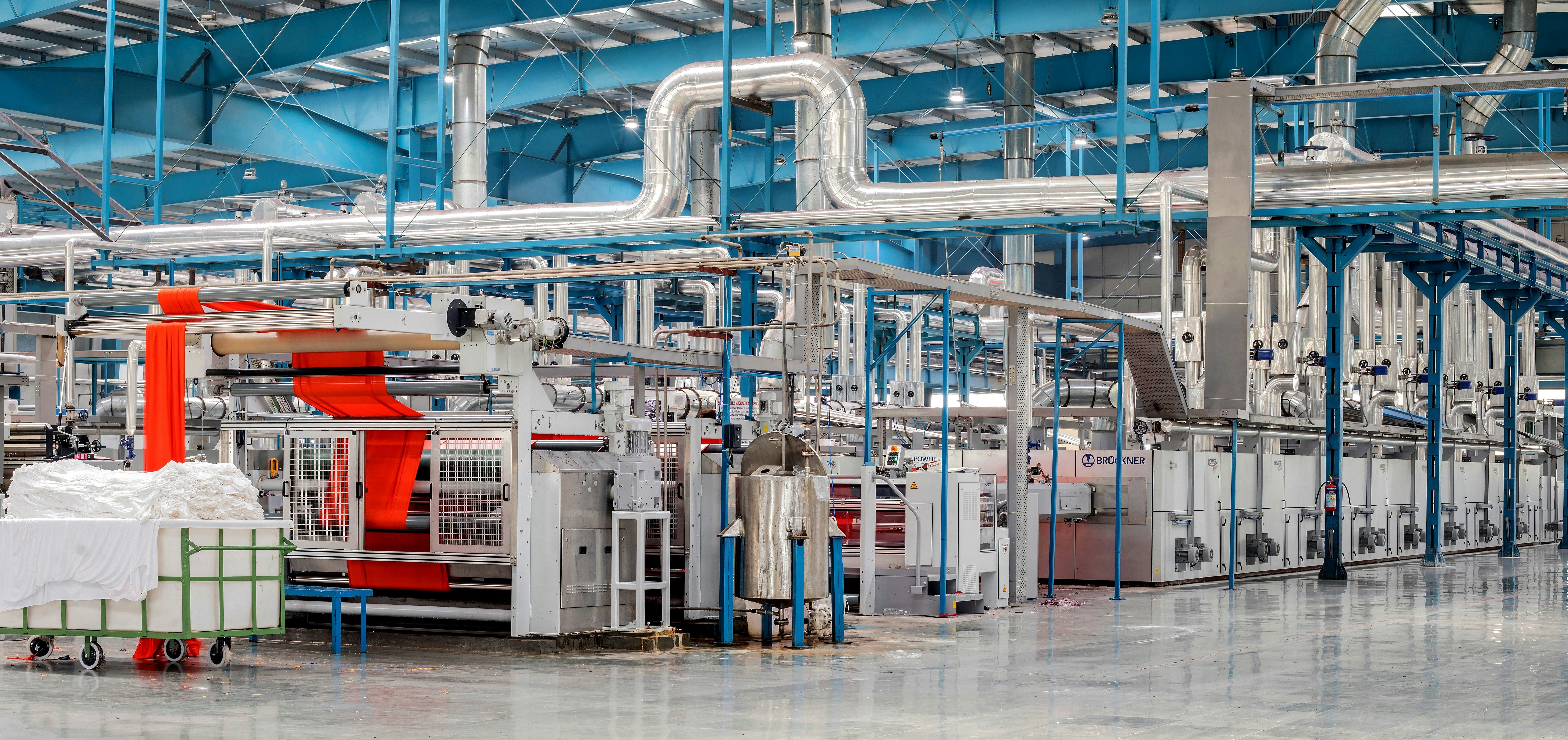 Industrial textile factory with machinery and pipes