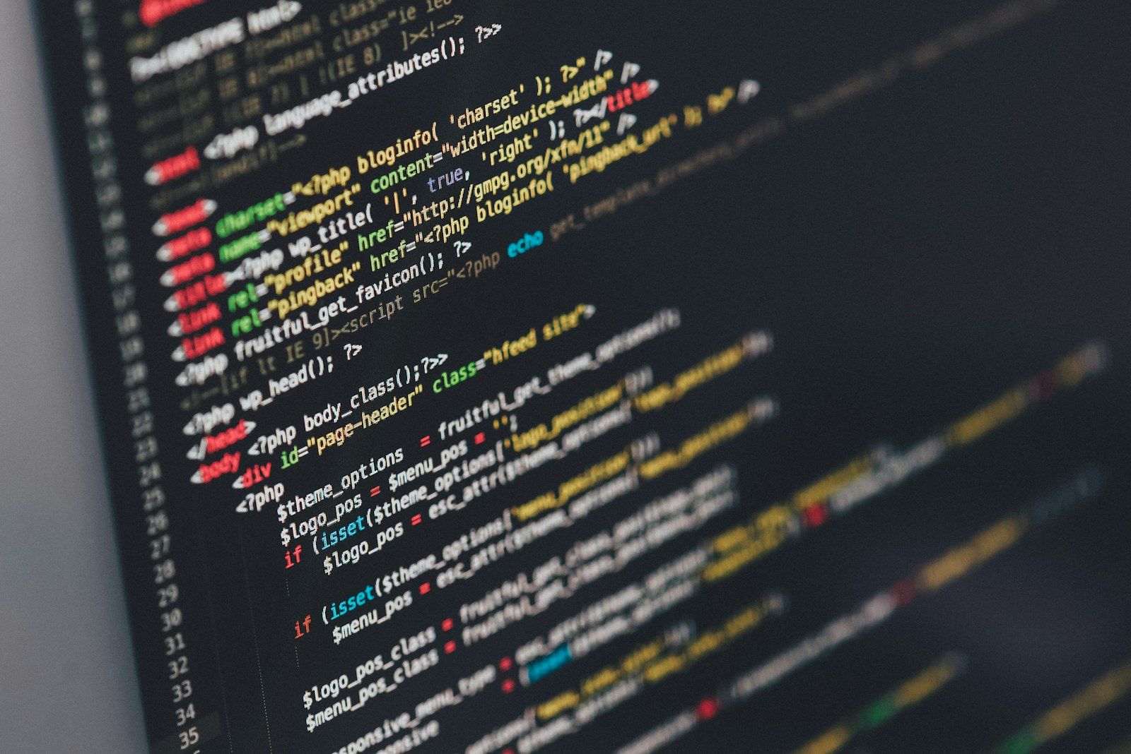 Close-up of source code on a monitor